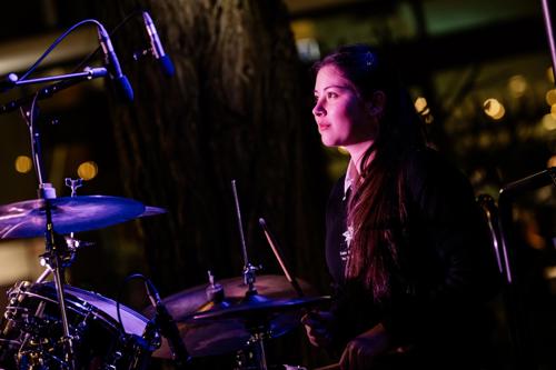 Aria performs on the drums at Music Fest